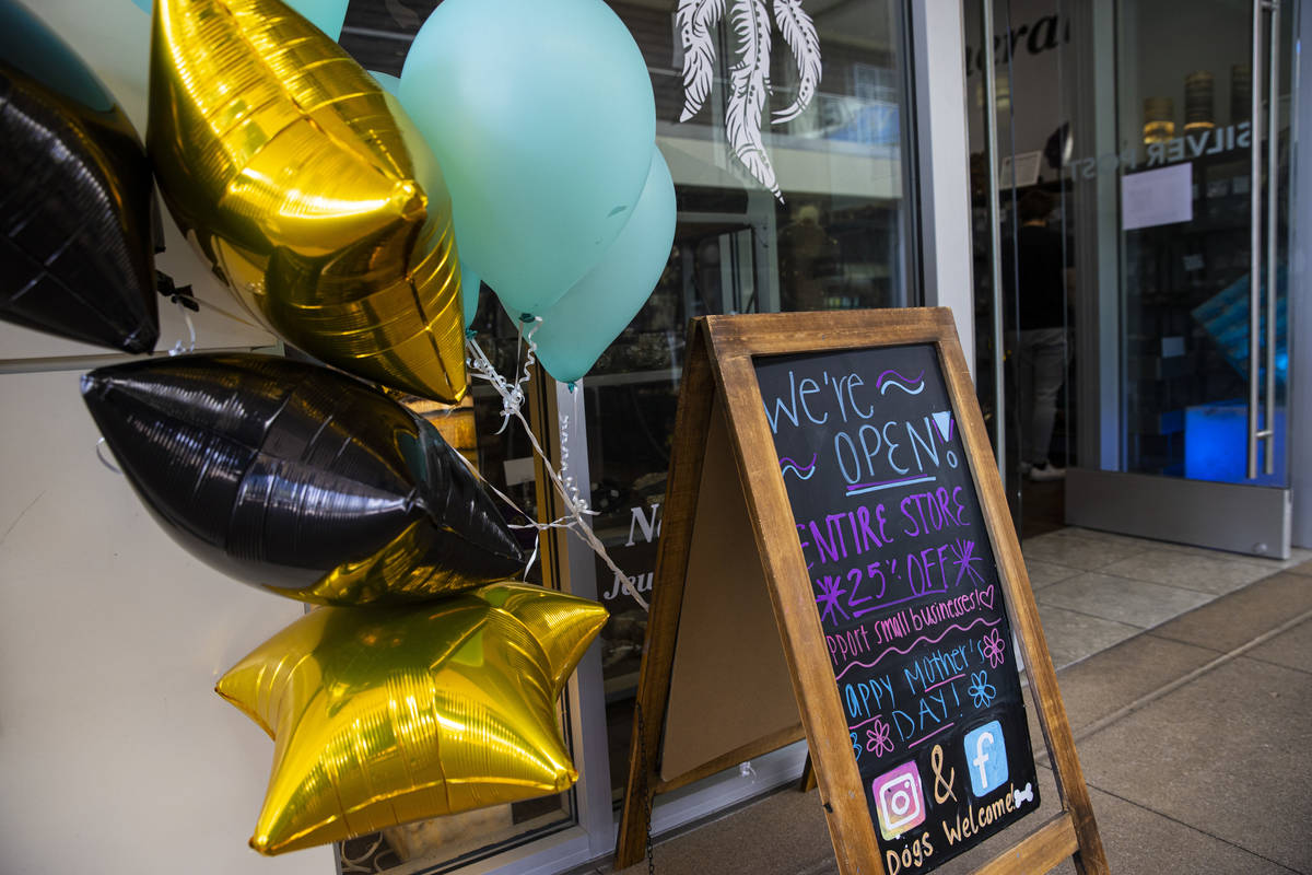 A sign outside of Silver Post as some businesses reopen at Downtown Summerlin in Las Vegas on S ...