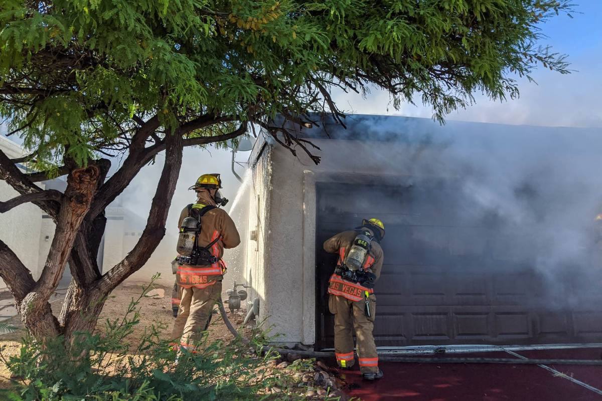 Crews battle a fire Saturday, May 9, 2020, on the 7800 block of Sparkle Avenue in Las Vegas. (L ...