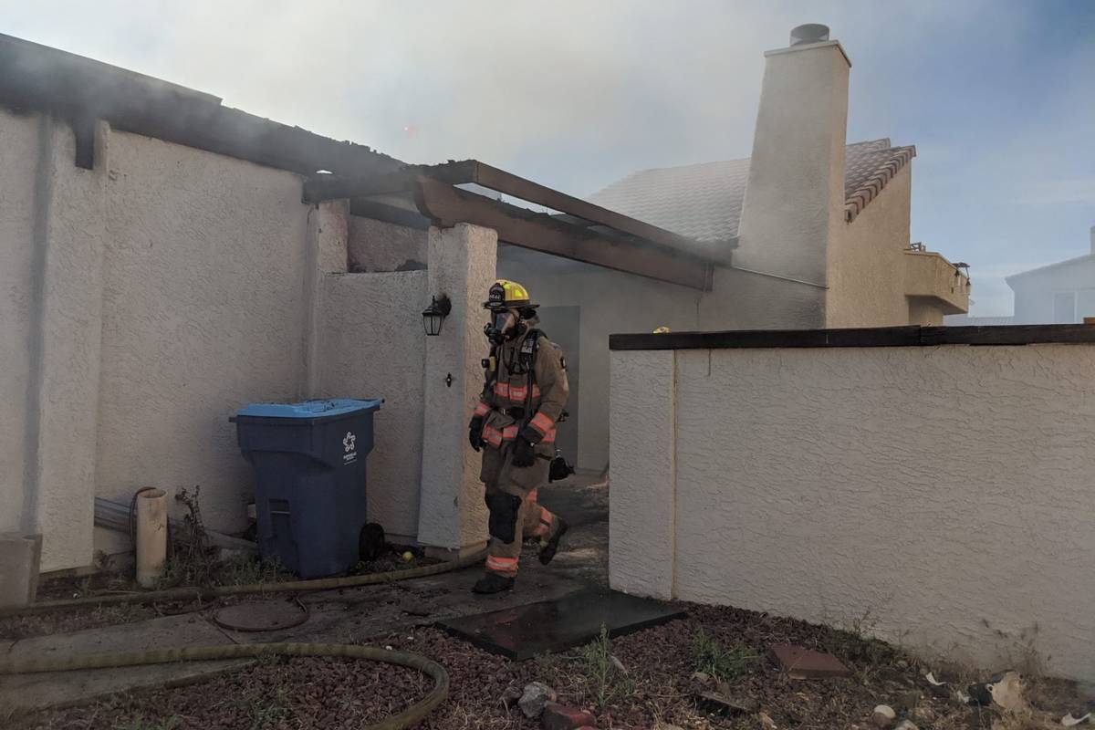 Crews battle a fire Saturday, May 9, 2020, on the 7800 block of Sparkle Avenue in Las Vegas. (L ...