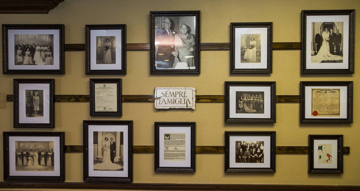 Owner Dan Thompson proudly displays his Italian family heritage on the wall near the kitchen at ...
