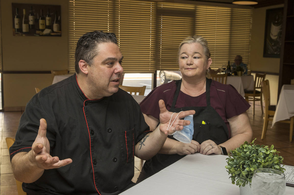 D'Agostino's Trattoria owners Dan and Brandi Thompson prepare for their Mother's Day diners on ...