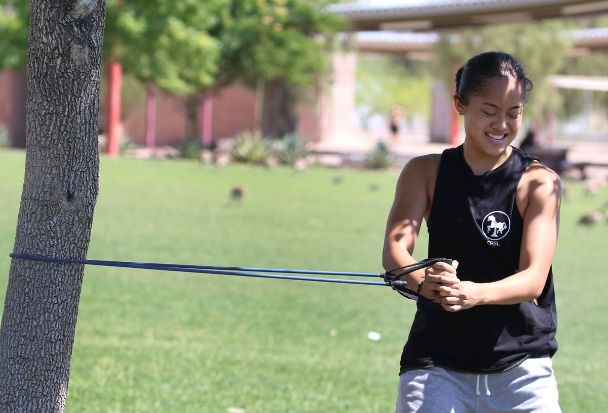 Liberty High School basketball player Raina Bitanga works out at Cornerstone Park on Monday, Ma ...