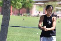 Liberty High School basketball player Raina Bitanga works out at Cornerstone Park on Monday, Ma ...