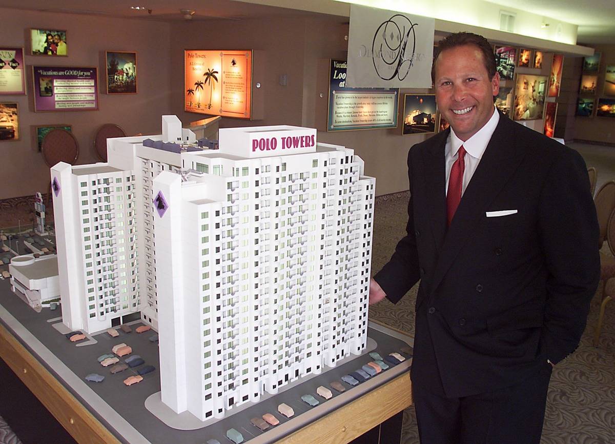 File photo of Stephen J. Cloobeck with model of a proposed tower at Polo Towers, one of his for ...