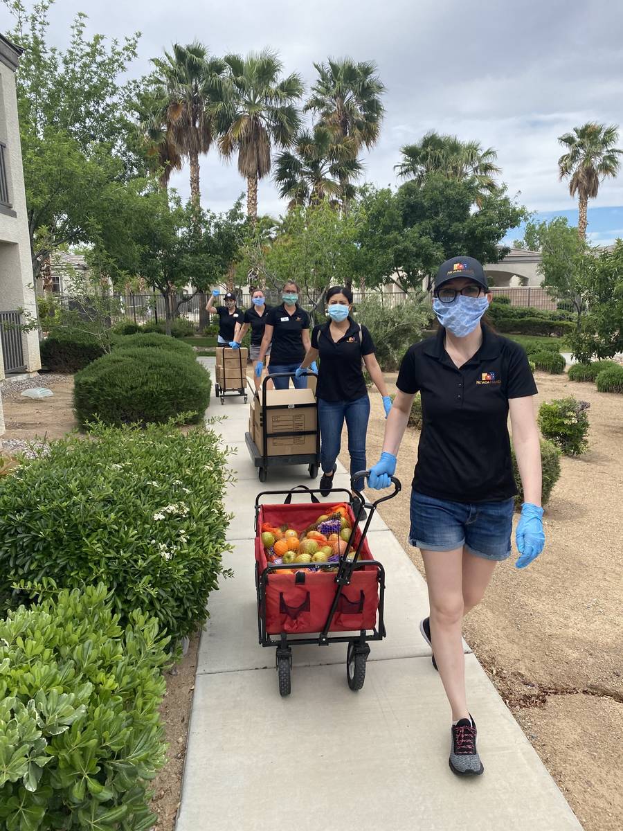 Nevada HAND team members deliver groceries to low-income seniors. (Nevada HAND)