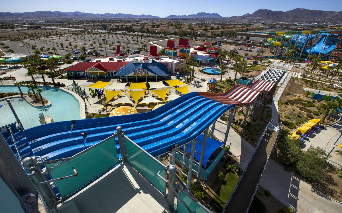 The parking lot is nearly empty and attractions currently shut down yet management and staff ar ...