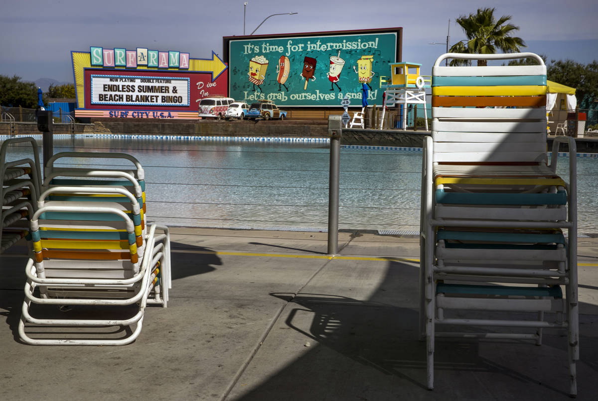 Tables and chairs are being reconfigured about the Surf-A-Rama Wave Pool to allow for social di ...