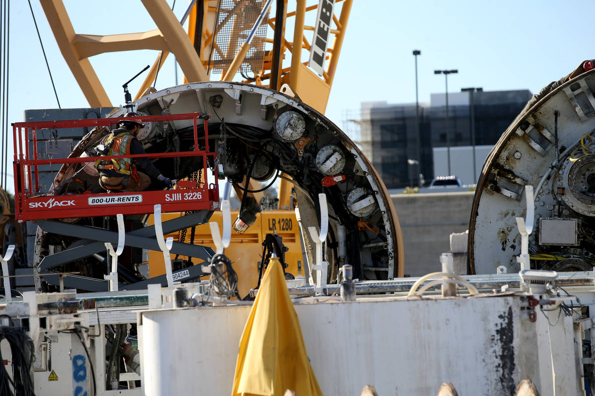 The Boring Co. workers prepare to lower the drill assembly to begin work on the second tunnel i ...