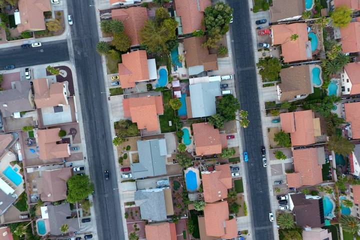 This aerial file photo shows home on Valle Verde Drive and Warm Springs Road in Henderson. (Mic ...