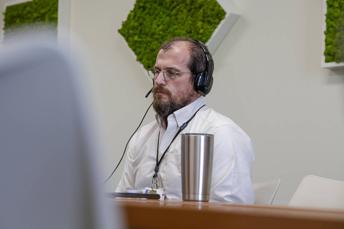 Lead Clinician Matt Turner speaks to potential clients about the mental health services offered ...