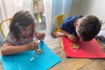 Residents of Inspirada Lily and Kaleo Mendoza enjoy creating their suncatchers. (Inspirada Comm ...