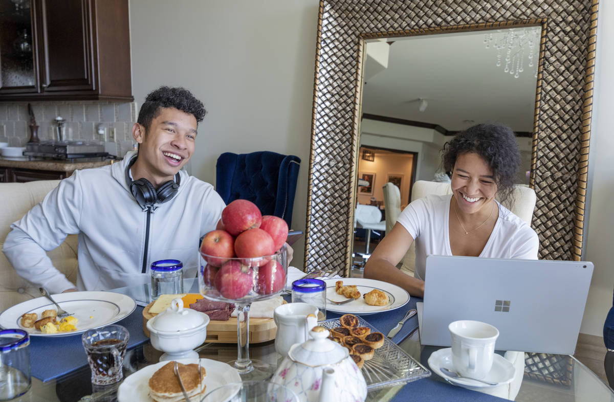 Siblings Lucas Williams, 21, and Amber, 25, eat brunch and work from their fatherÕ, Michae ...
