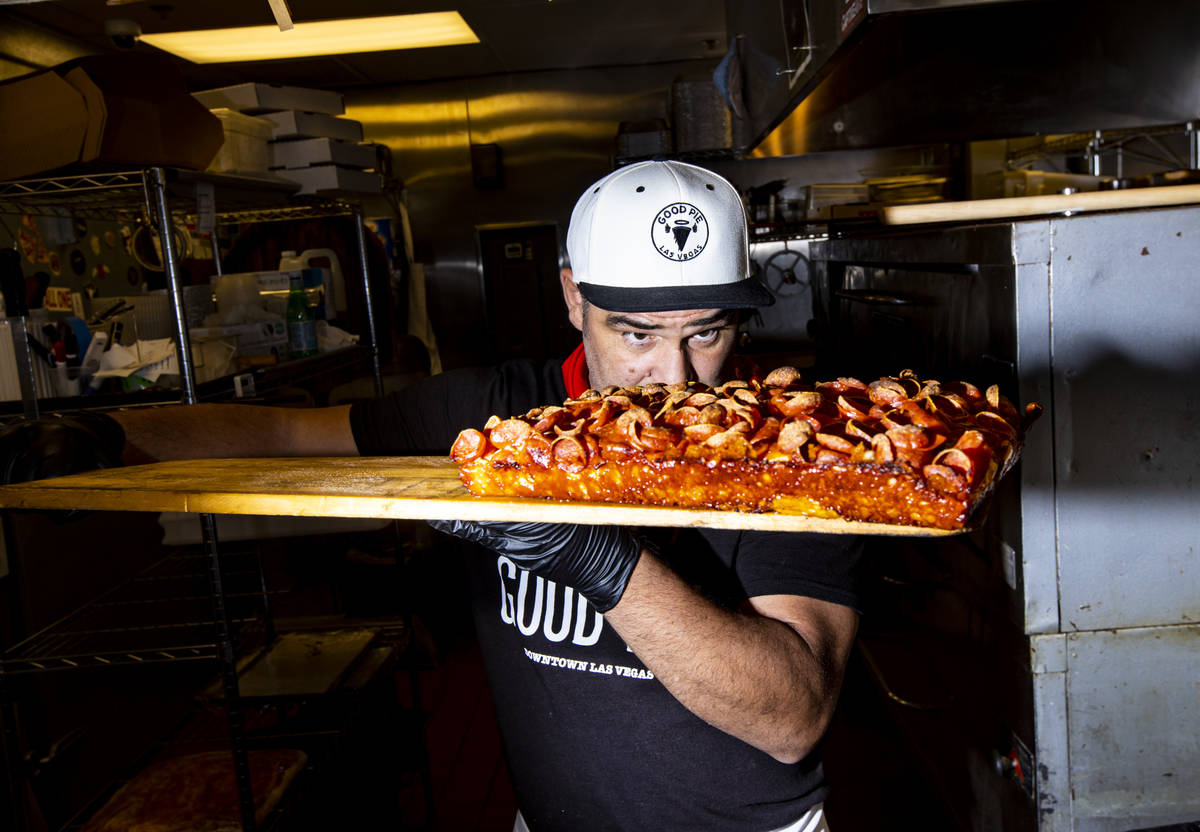 Vincent Rotolo, owner of Good Pie, prepares a triple pepperoni Detroit style pizza in downtown ...