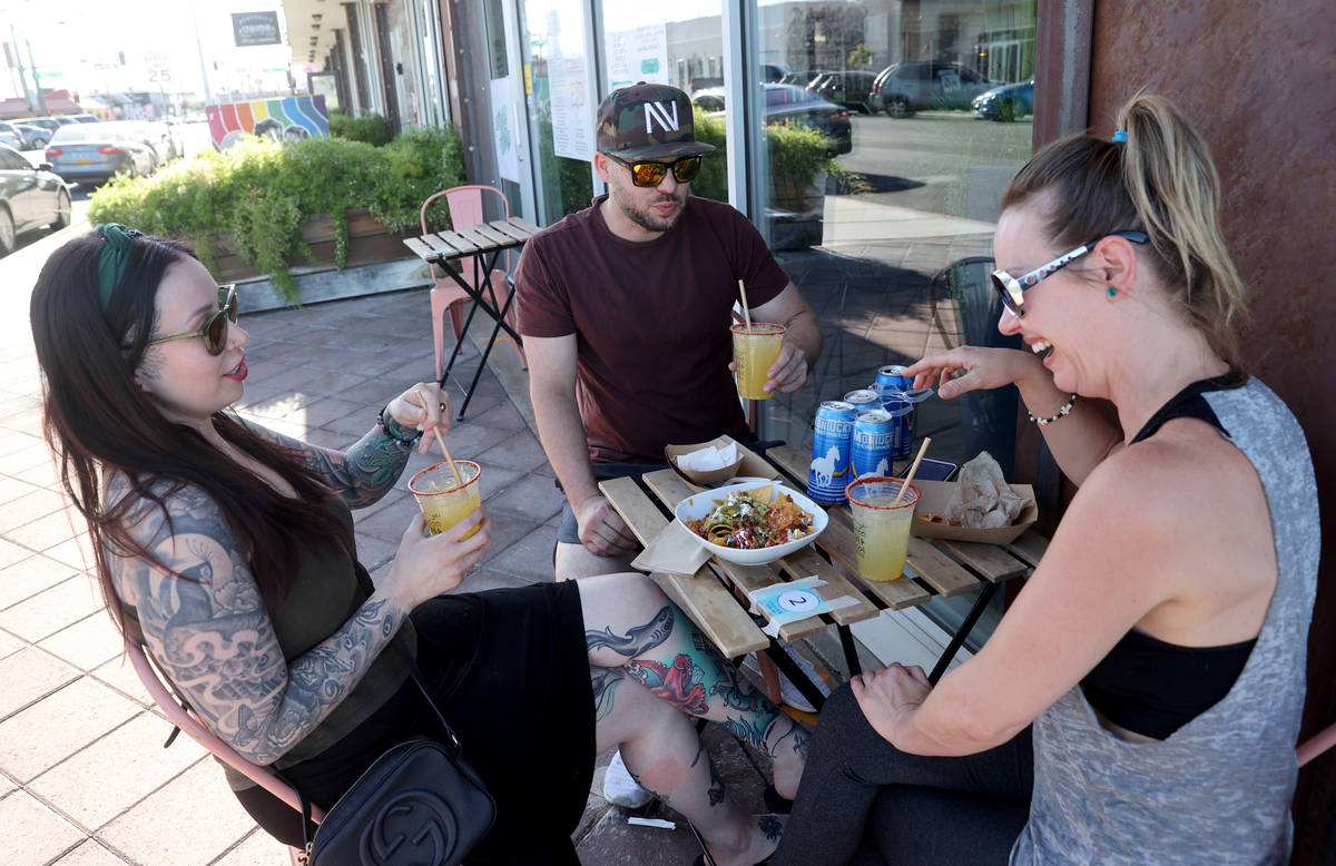 Katie Royball, from left, Sean Adams, of Las Vegas, and Tawny Shoemaker of Henders at Tacotaria ...