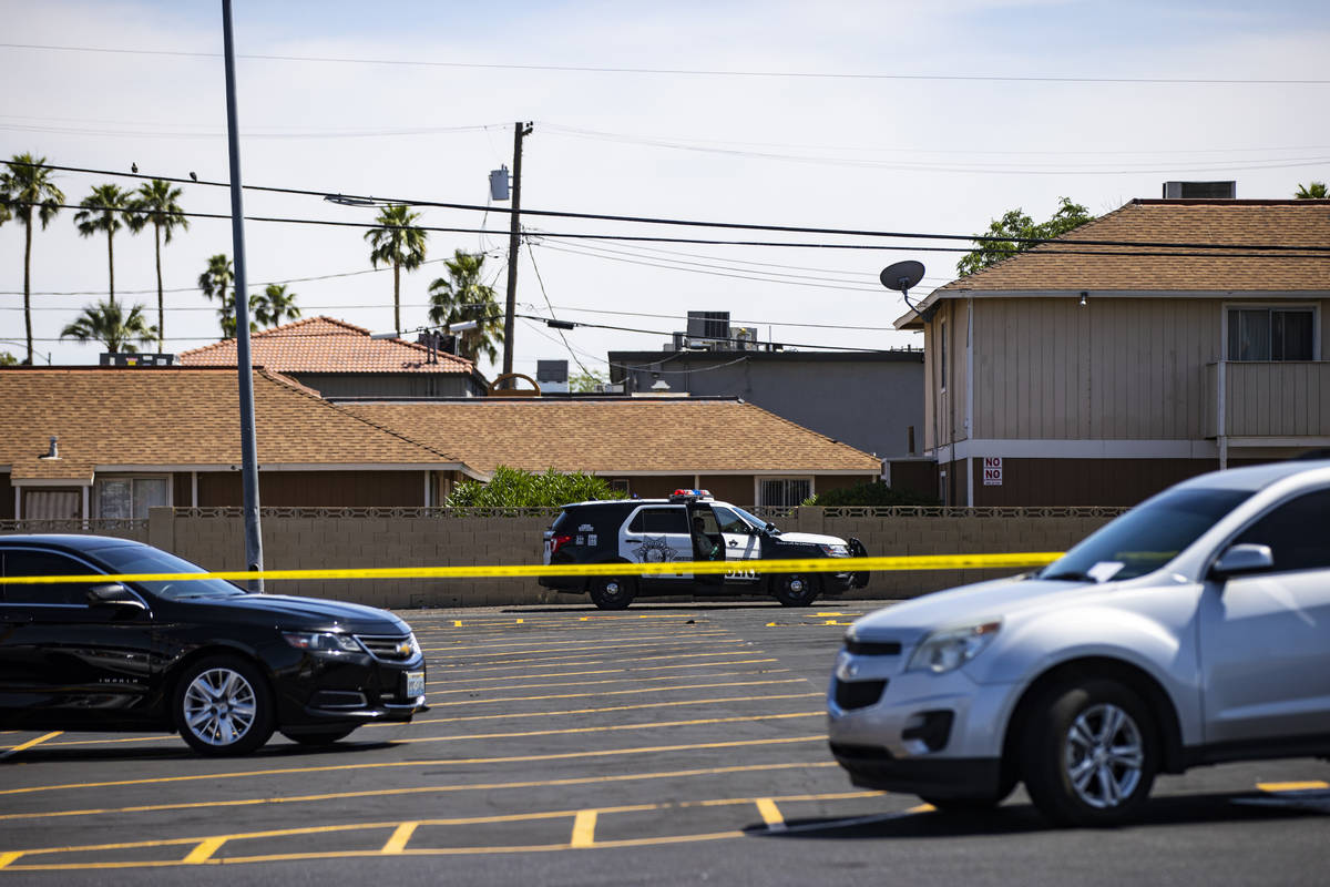 Las Vegas police investigate the scene of a shooting at Tropicana Avenue and Maryland Parkway i ...