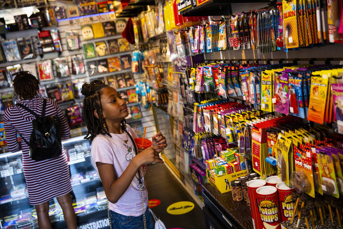 Naja, 10, of Las Vegas, explores the Las Vegas Magic Shop at the Downtown Container Park in Las ...