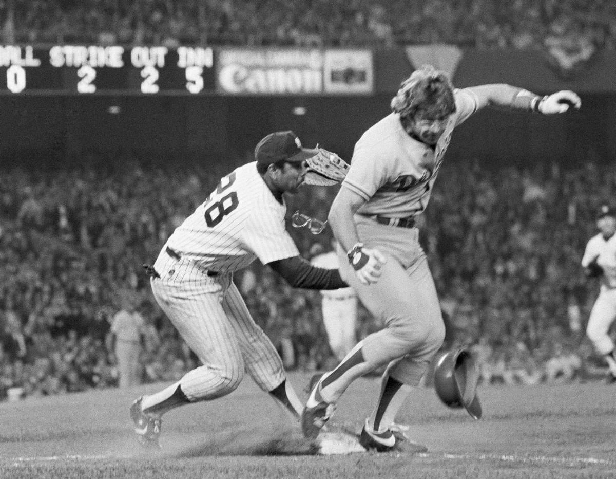 FILE - In this October 1981 file photo, Los Angeles Dodgers' Steve Yeager, right, and New York ...