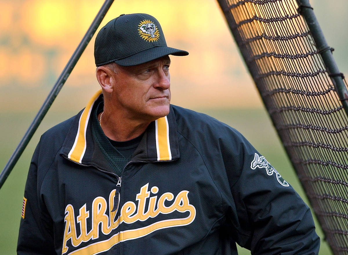 FILE - In this Sept. 30, 2002, file photo, Oakland Athletics manager Art Howe watches over warm ...