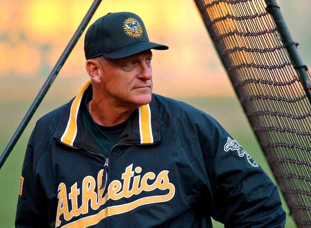 FILE - In this Sept. 30, 2002, file photo, Oakland Athletics manager Art Howe watches over warm ...