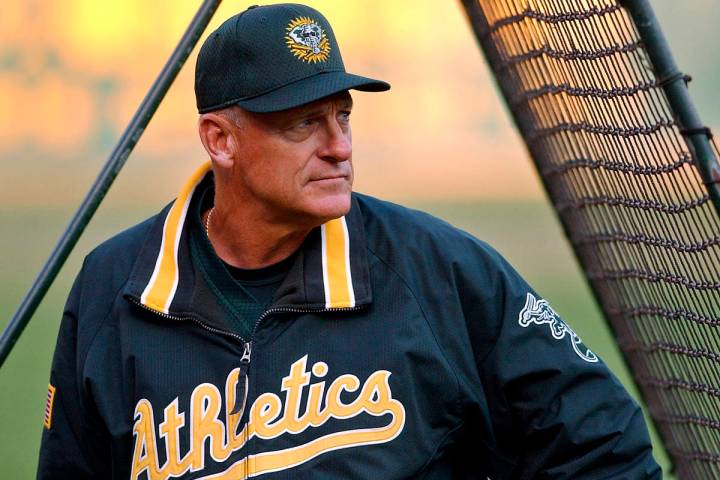 FILE - In this Sept. 30, 2002, file photo, Oakland Athletics manager Art Howe watches over warm ...