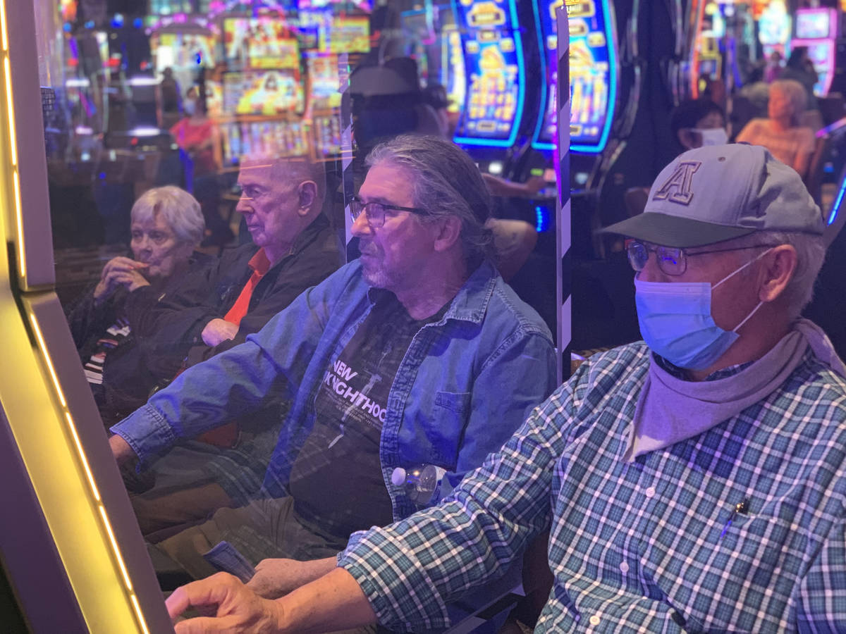 Plexiglass separates individuals as they play games at Gila River Casino Wild Horse Pass, on th ...