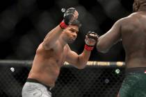 Alistair Overeem, left, in action against Jairzinho Rozenstruik during their heavyweight mixed ...