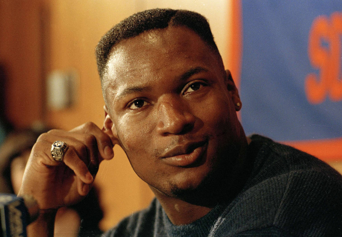 Football and baseball star Bo Jackson responds to questions during a news conference at Auburn ...