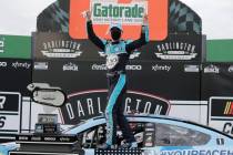 Kevin Harvick celebrates after winning the NASCAR Cup Series auto race Sunday, May 17, 2020, in ...