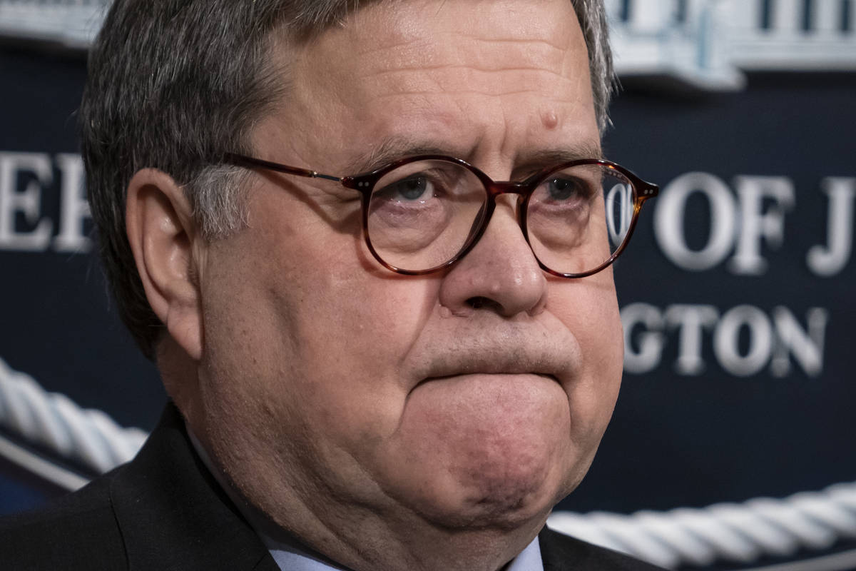 FILE - In this Jan. 13, 2020, file photo Attorney General William Barr speaks to reporters at t ...