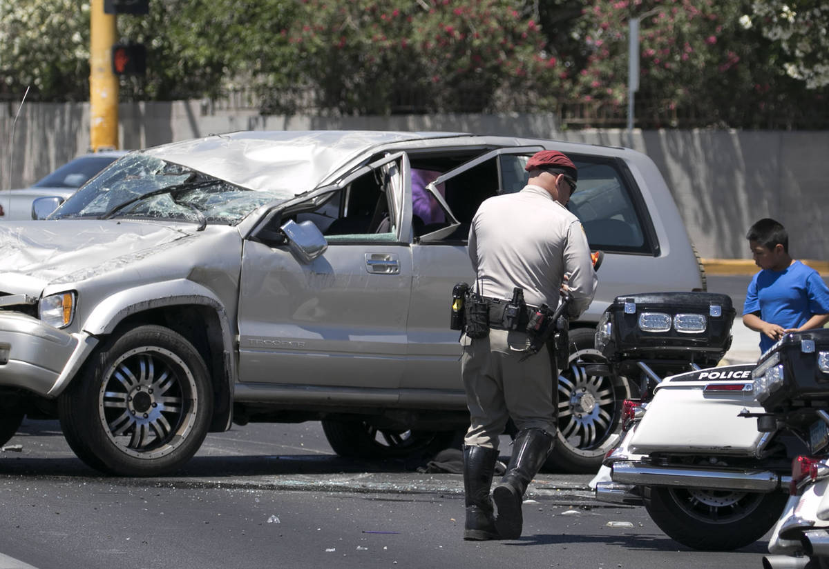 Las Vegas police is investigating a two-vehicle crash that caused one vehicle to flip over at t ...
