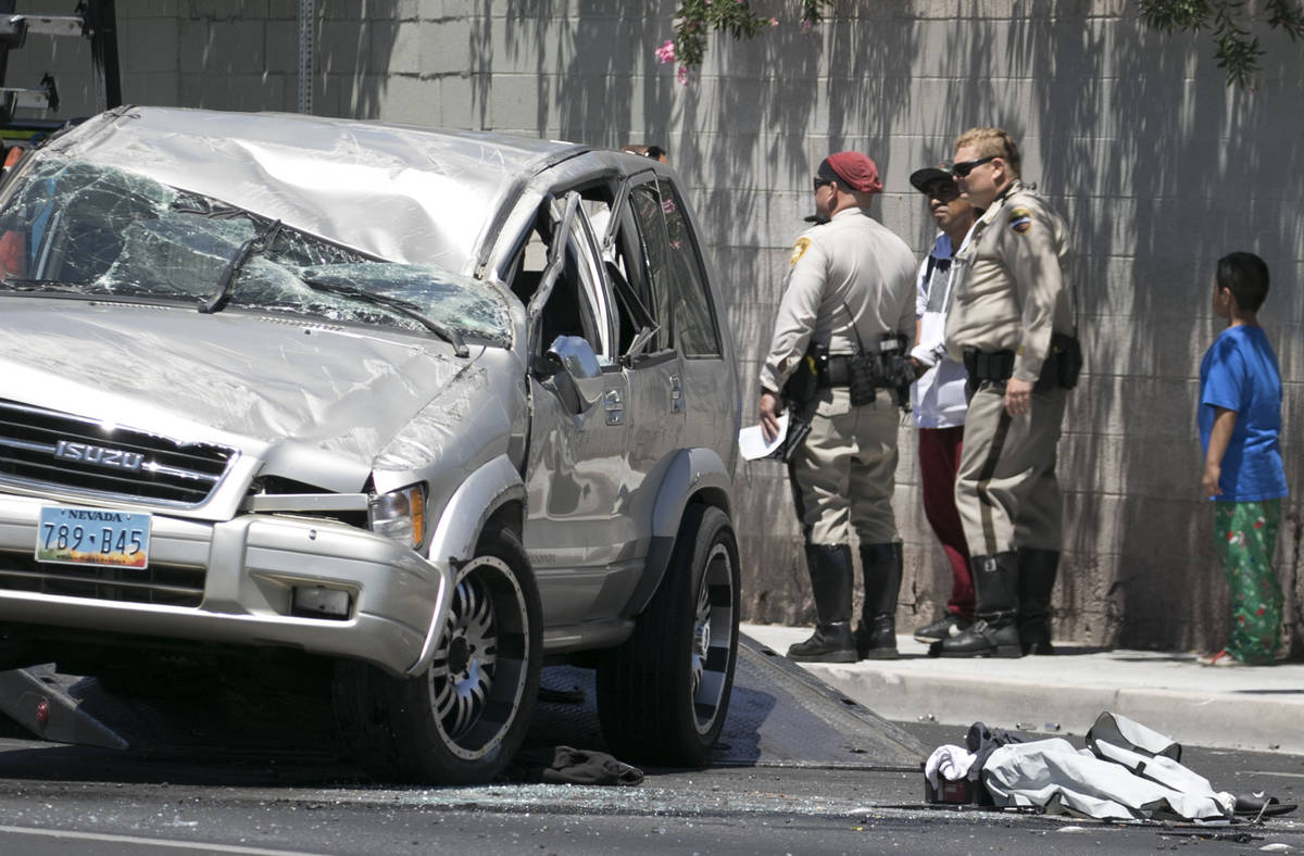 Las Vegas police is investigating a two-vehicle crash that caused one vehicle to flip over at t ...