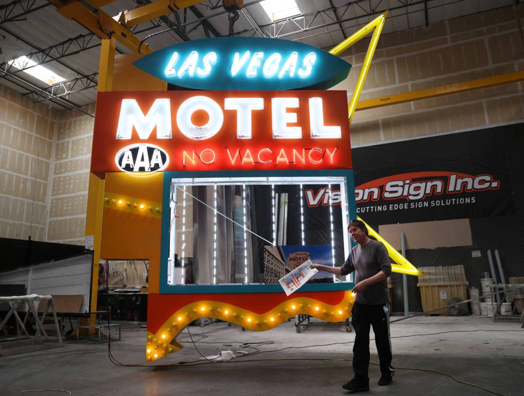 Las Vegas City Attorney Brad Jerbic in front of the Las Vegas Motel sign in the process of rest ...