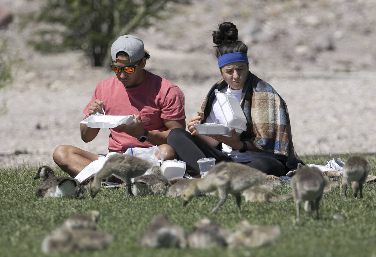 Jesse Gonzalez and his girlfriend, Nicole Varela, both of Henderson, enjoy their breakfast at C ...