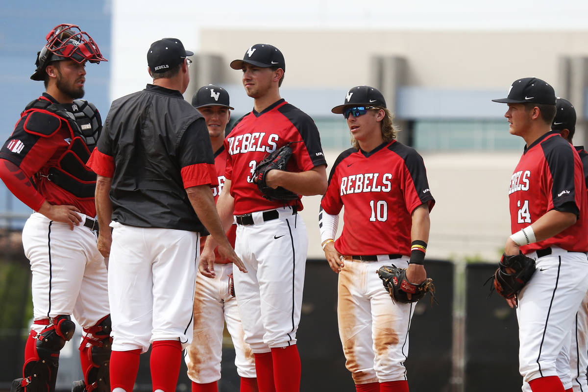 UNLV's baseball players talk during a visit to the mound against Air Force during the sixth inn ...