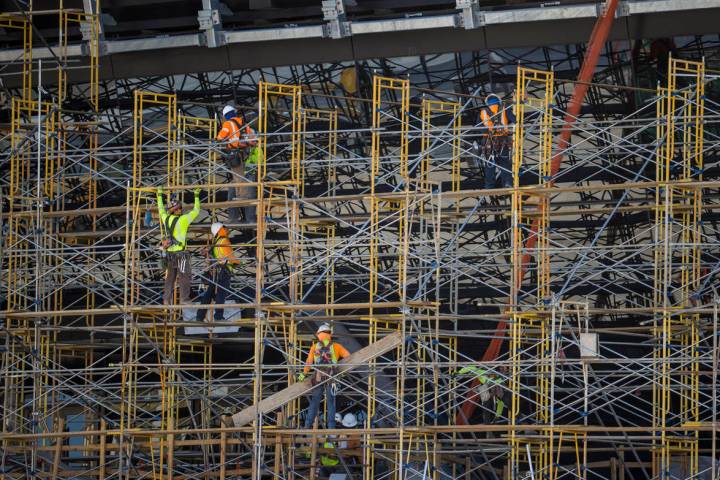 Crews at Allegiant Stadium begin to take down scaffolding on Tuesday, May 19, 2020, in Las Vega ...