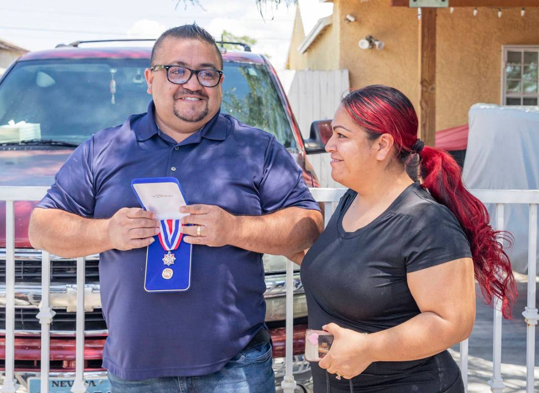 Jose Alvarado, left, and his wife Eugenia Alvarado smile after Jose received a medal of honor o ...
