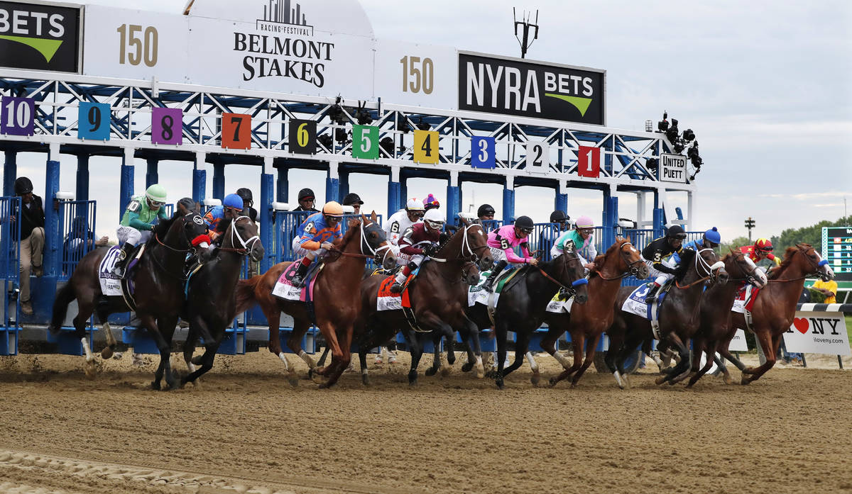 FILE - In this June 9, 2018, file photo, horses break from the starting gate at the beginning o ...