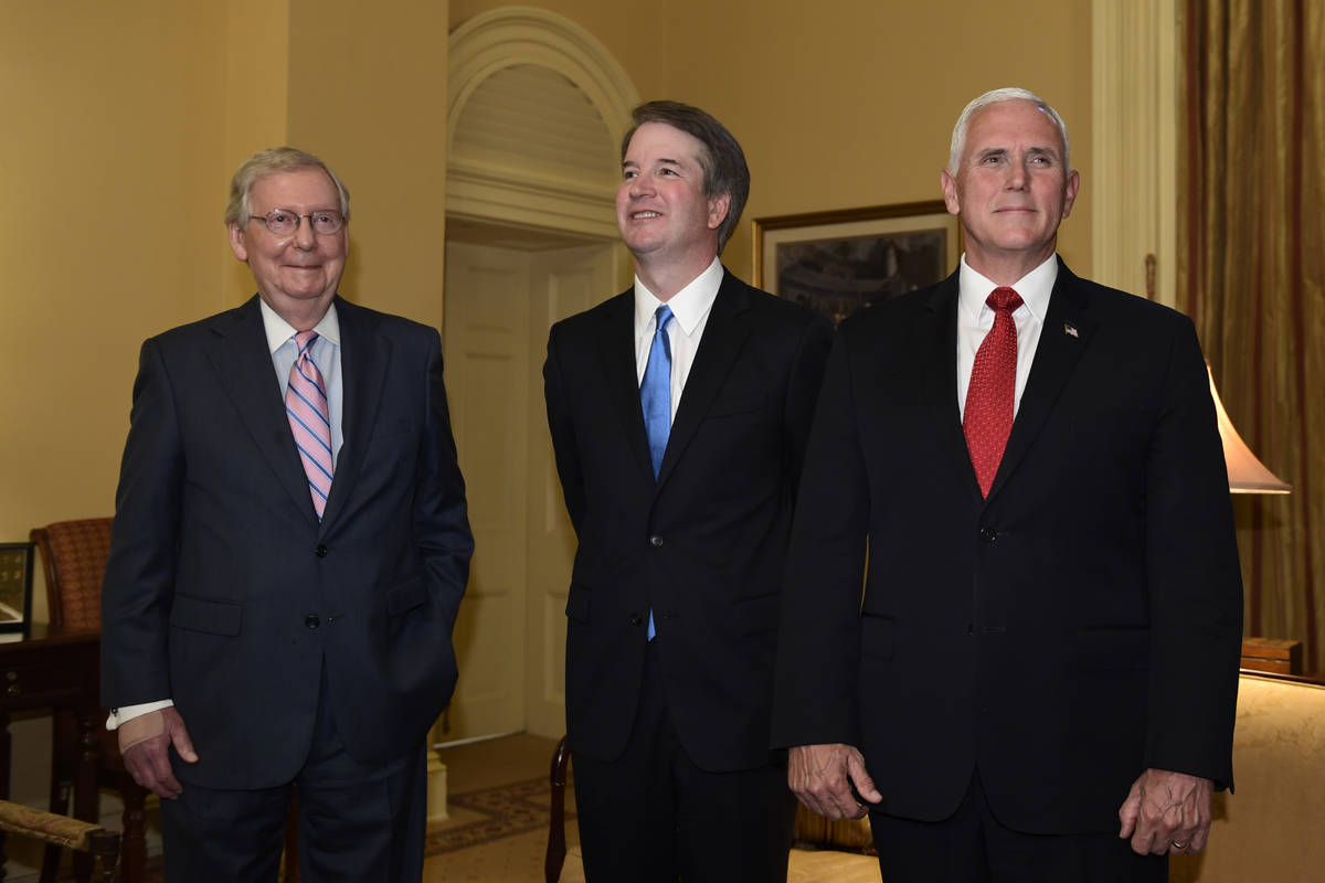 Senate Majority Leader Mitch McConnell of Ky., left, welcomes Supreme Court nominee Brett Kavan ...