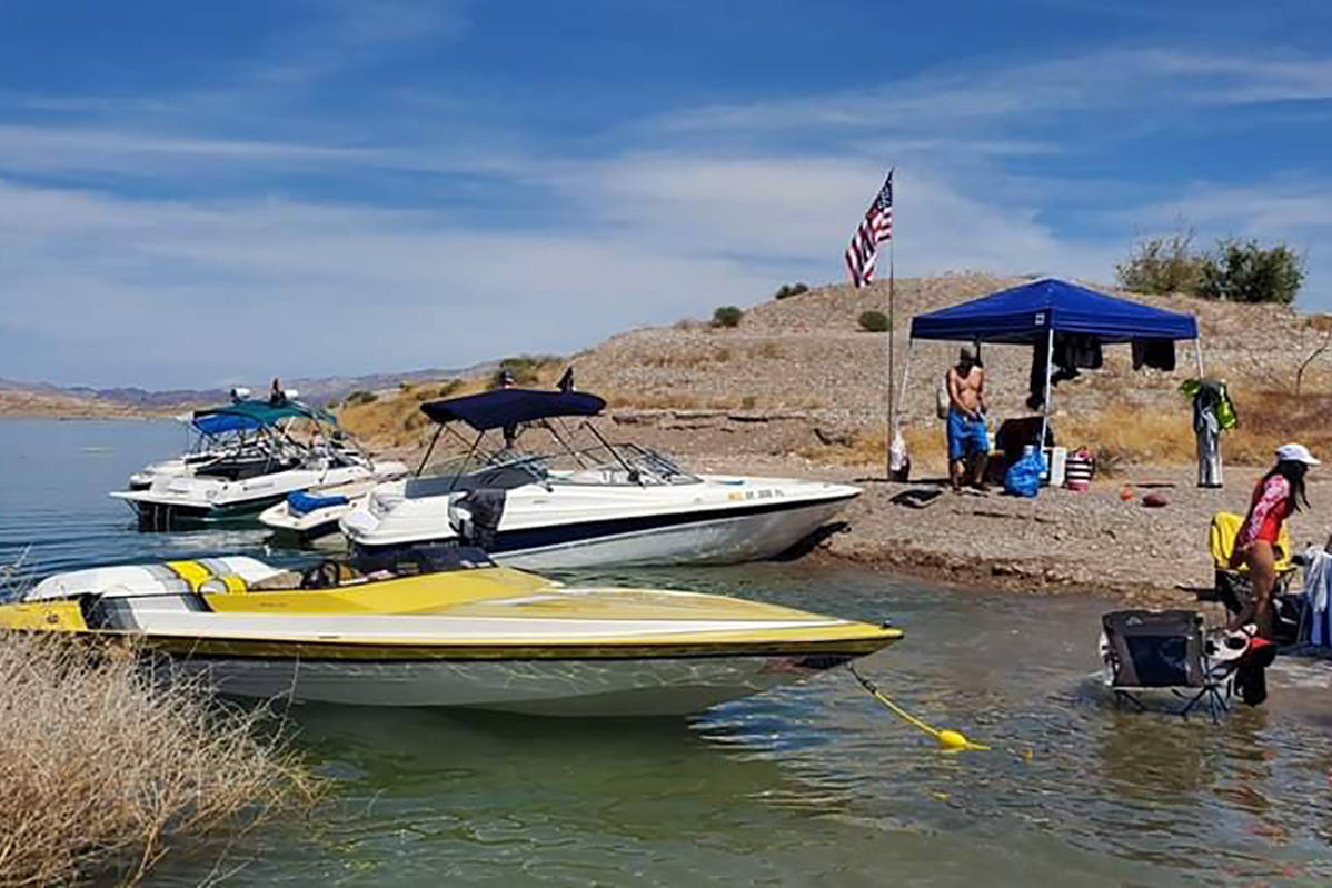 Some boaters get an early start on the Memorial Day Weekend on Thursday, May 21, 2020, at Lake ...