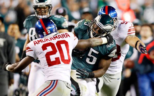 New York Giants corner back Prince Amukamara (20) tries to tackle Philadelphia Eagles running b ...