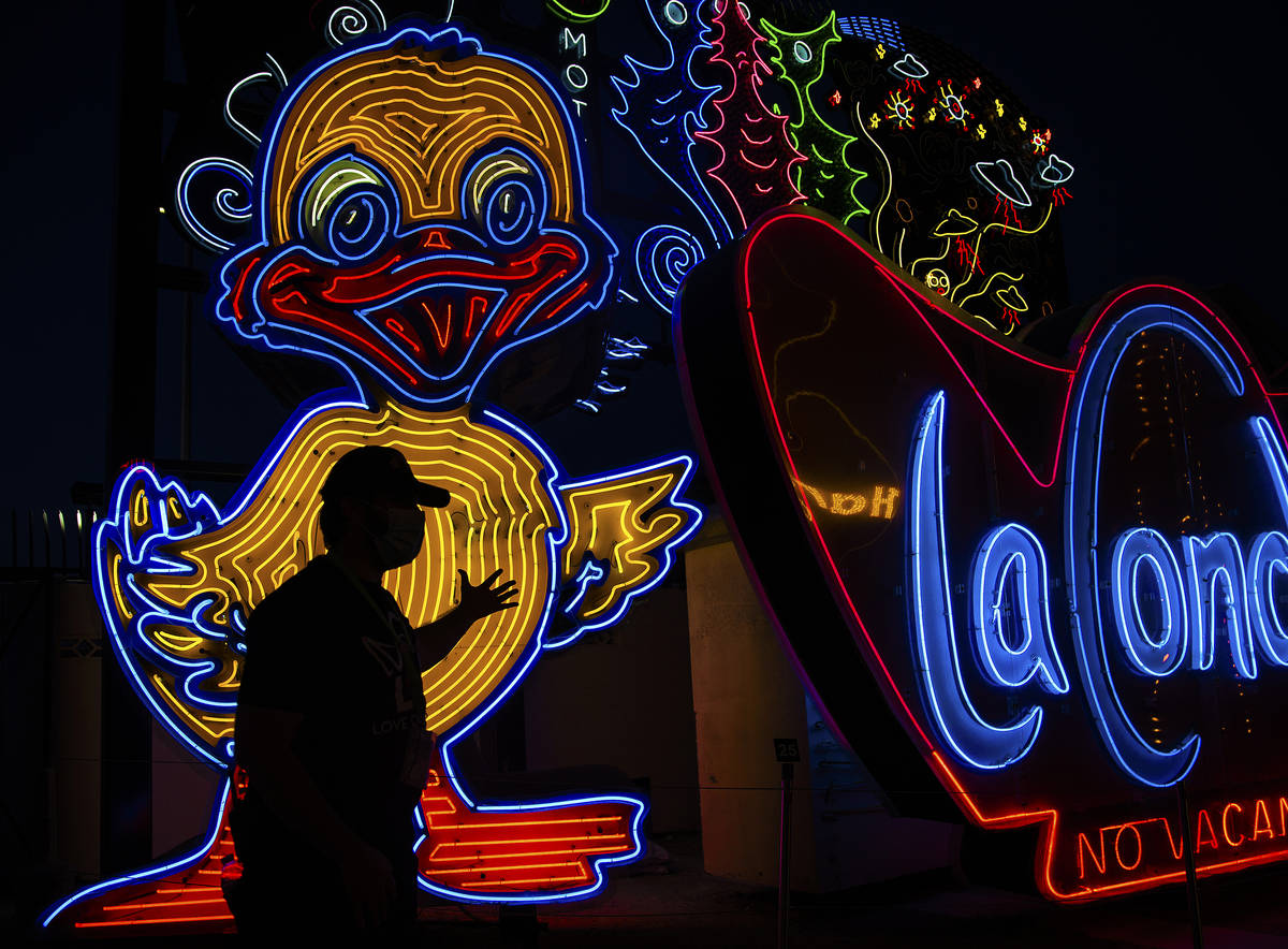 Interpreter Wyatt Currie leads a tour at The Neon Museum on Friday, May 22, 2020, in Las Vegas. ...