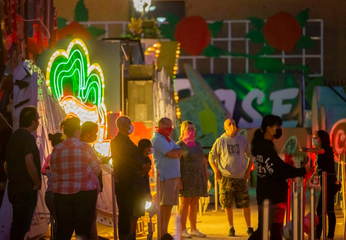 A group tours The Neon Museum on Friday, May 22, 2020, in Las Vegas. Friday was the first night ...