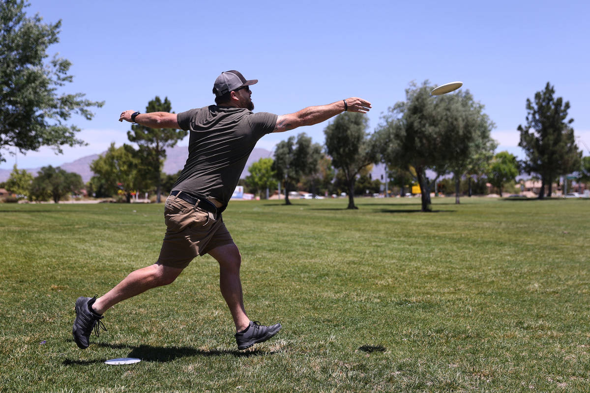 Jordan Stout of Las Vegas plays disc golf course at Mountain Crest Park in Las Vegas, Saturday, ...