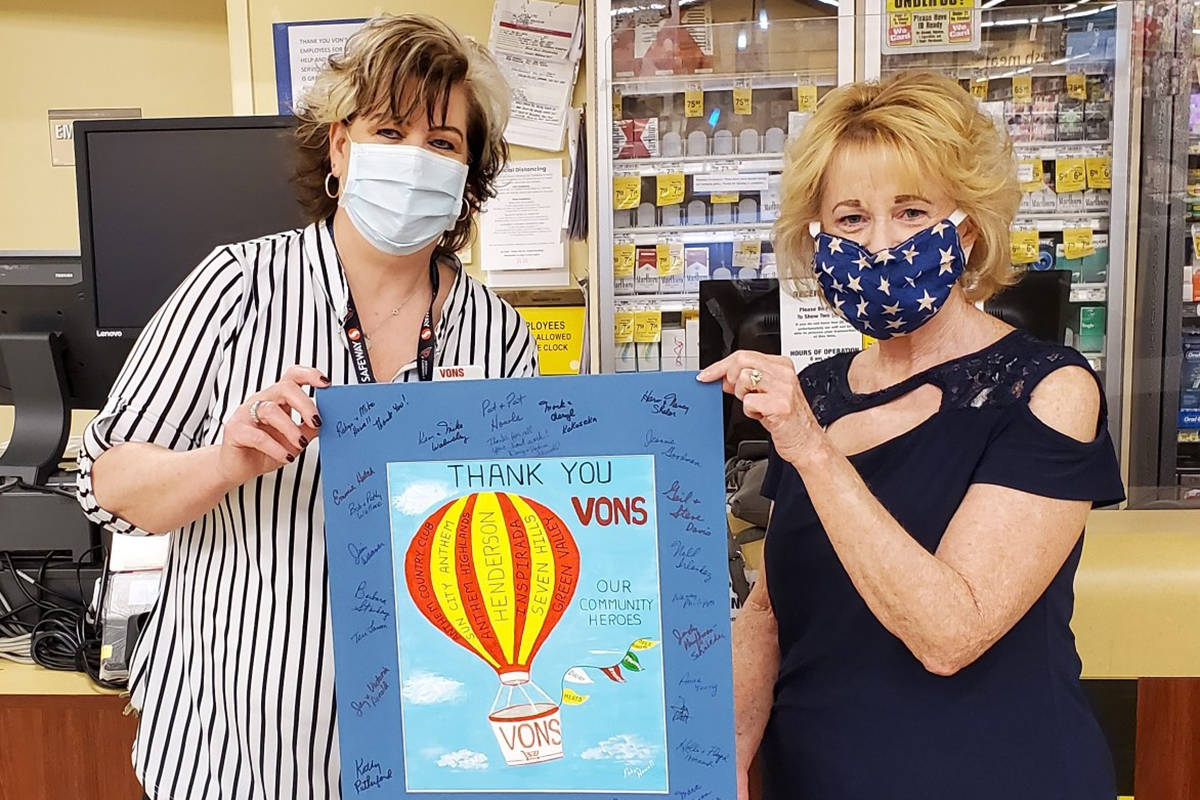 Robyn Howell (right) designed a poster for the staff at Vons at 2511 Anthem Village, Henderson ...