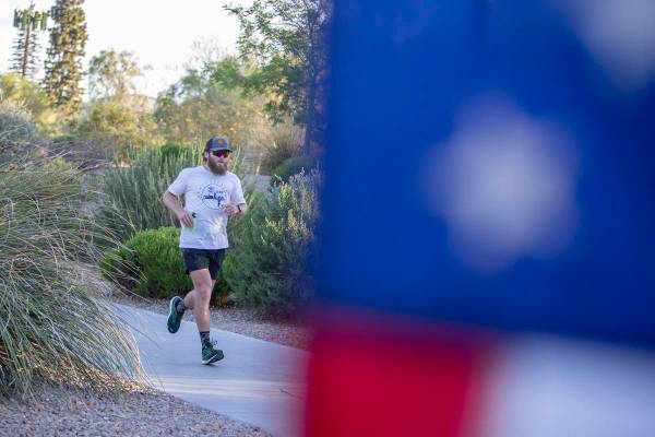 Peter Makredes runs laps around Exploration Peak Park to raise money for Mission 22, an organiz ...