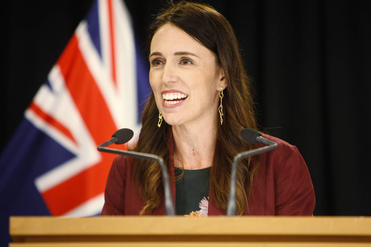 New Zealand Prime Minister Jacinda Ardern talks to reporters at Parliament in Wellington, New Z ...