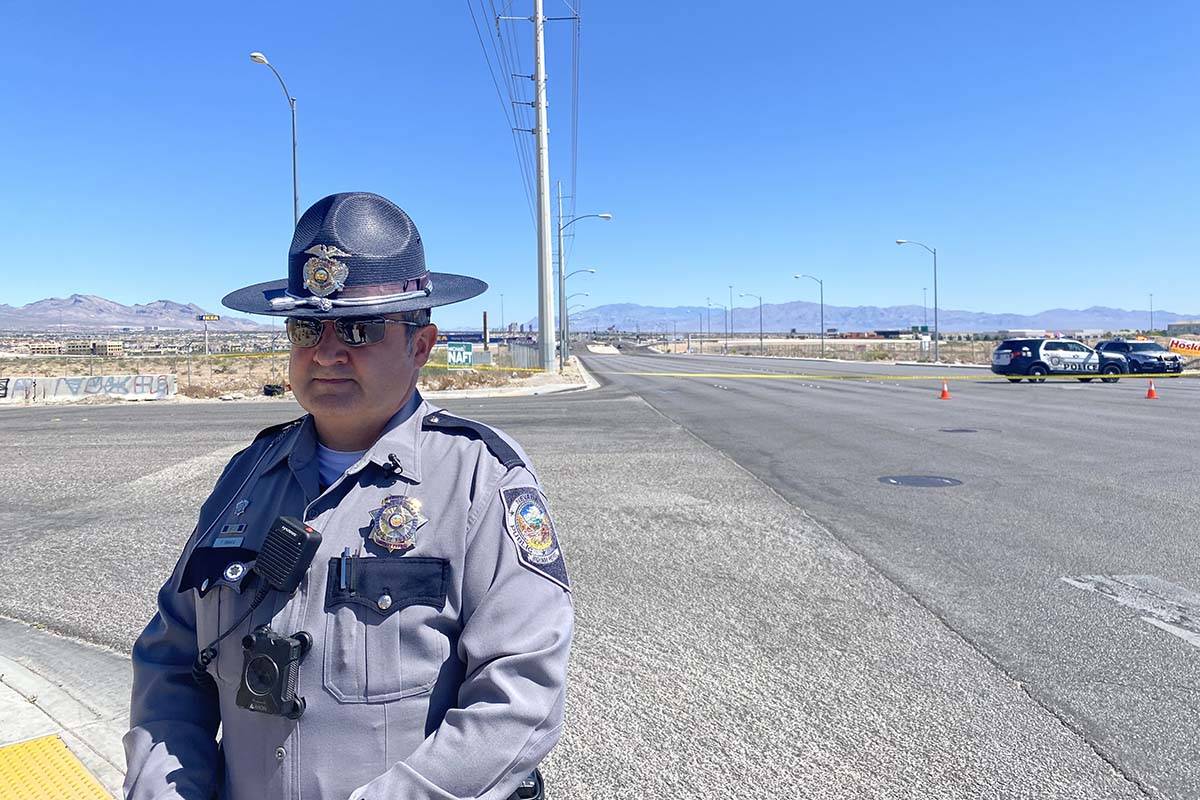Nevada Highway Patrol Trooper Travis Smaka briefs the media after a motorcyclist was killed in ...