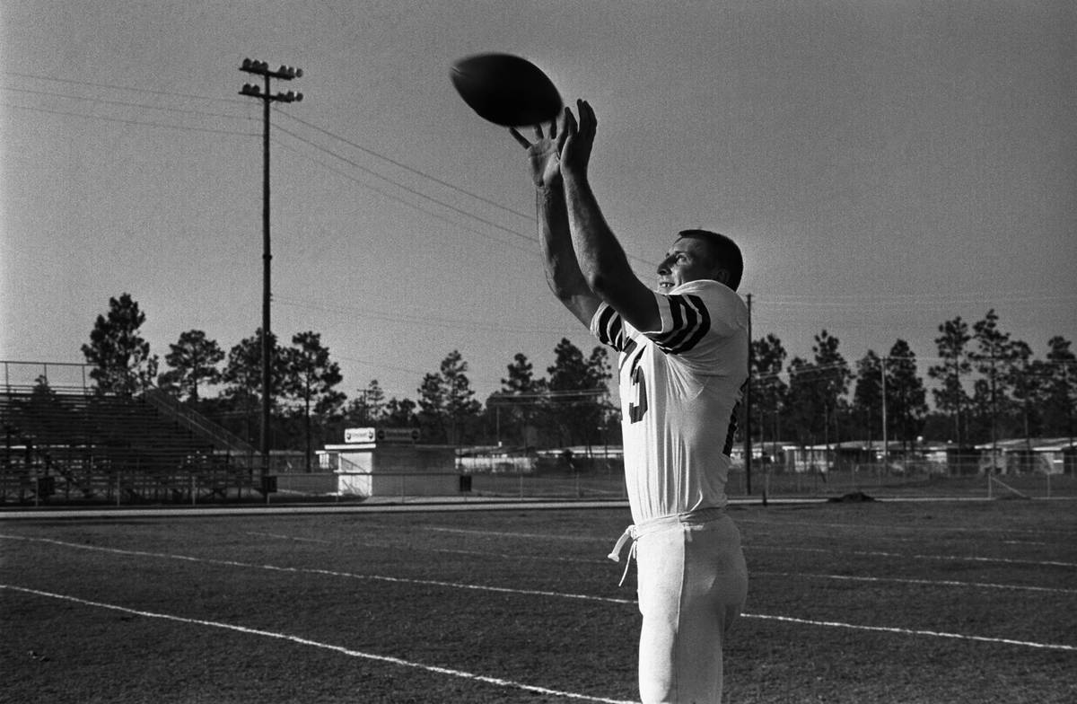 Fred Biletnikoff, Florida State University's All-America back, goes after a high pass in the Se ...