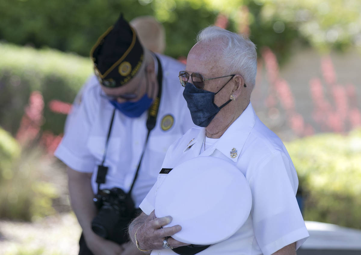World War II U.S. Army Air Corps veteran Jack Ford places his hat over his heart during the Ple ...
