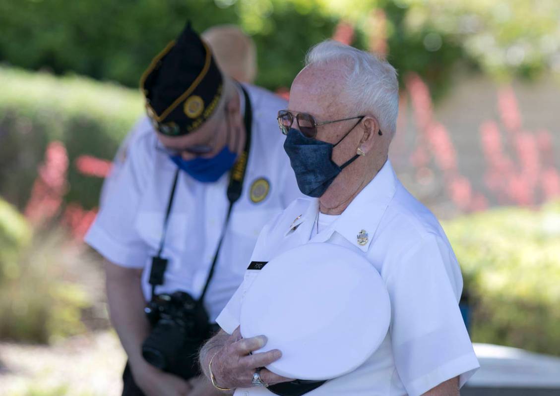 World War II U.S. Army Air Corps veteran Jack Ford places his hat over his heart during the Ple ...